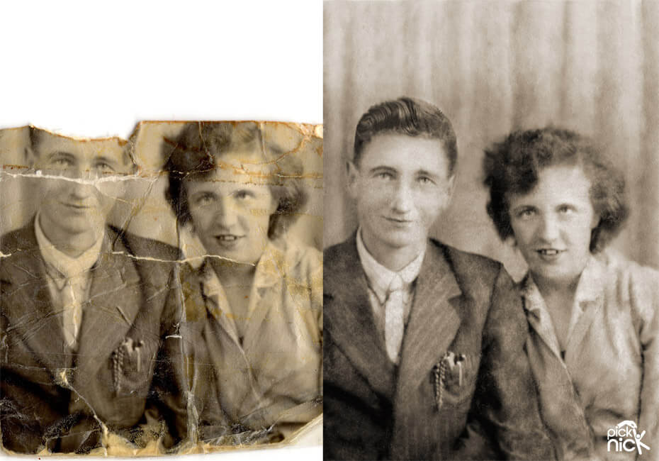 Repaired old photo of a couple. Damaged with part of the photo missing