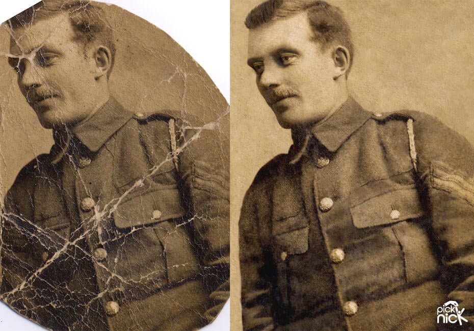 Photo restoration of an old photo of a man in military uniform. Severely damaged with missing sections. 