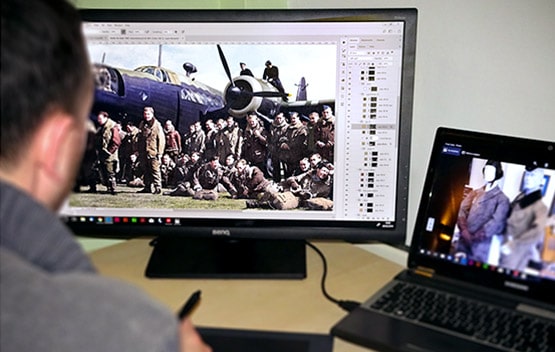 Nick in the process of colourising a photo