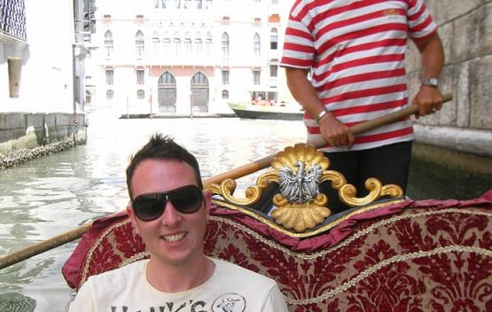 Gondola ride in Venice sun bleached photo