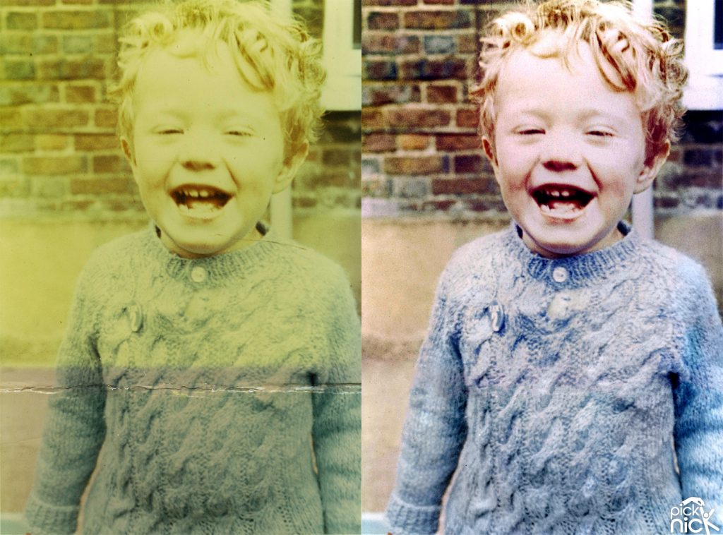 Sun damaged photo of a young happy boy